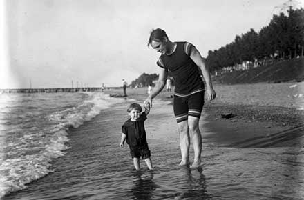Harvey J. Humphrey and his daughter on the beach