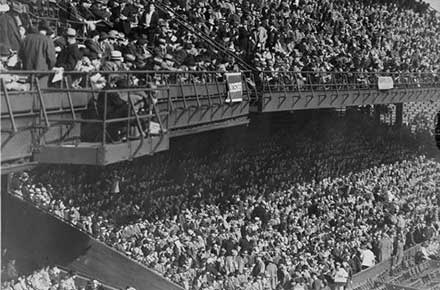Spectators in stands at ball game, League Park, 1937